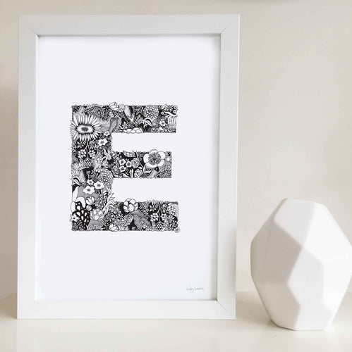 The floral letter 'E' artwork was illustrated by Hayley Lauren in Melbourne, Australia. It is the perfect artwork to personalise a nursery or kids bedroom. free shipping australia wide