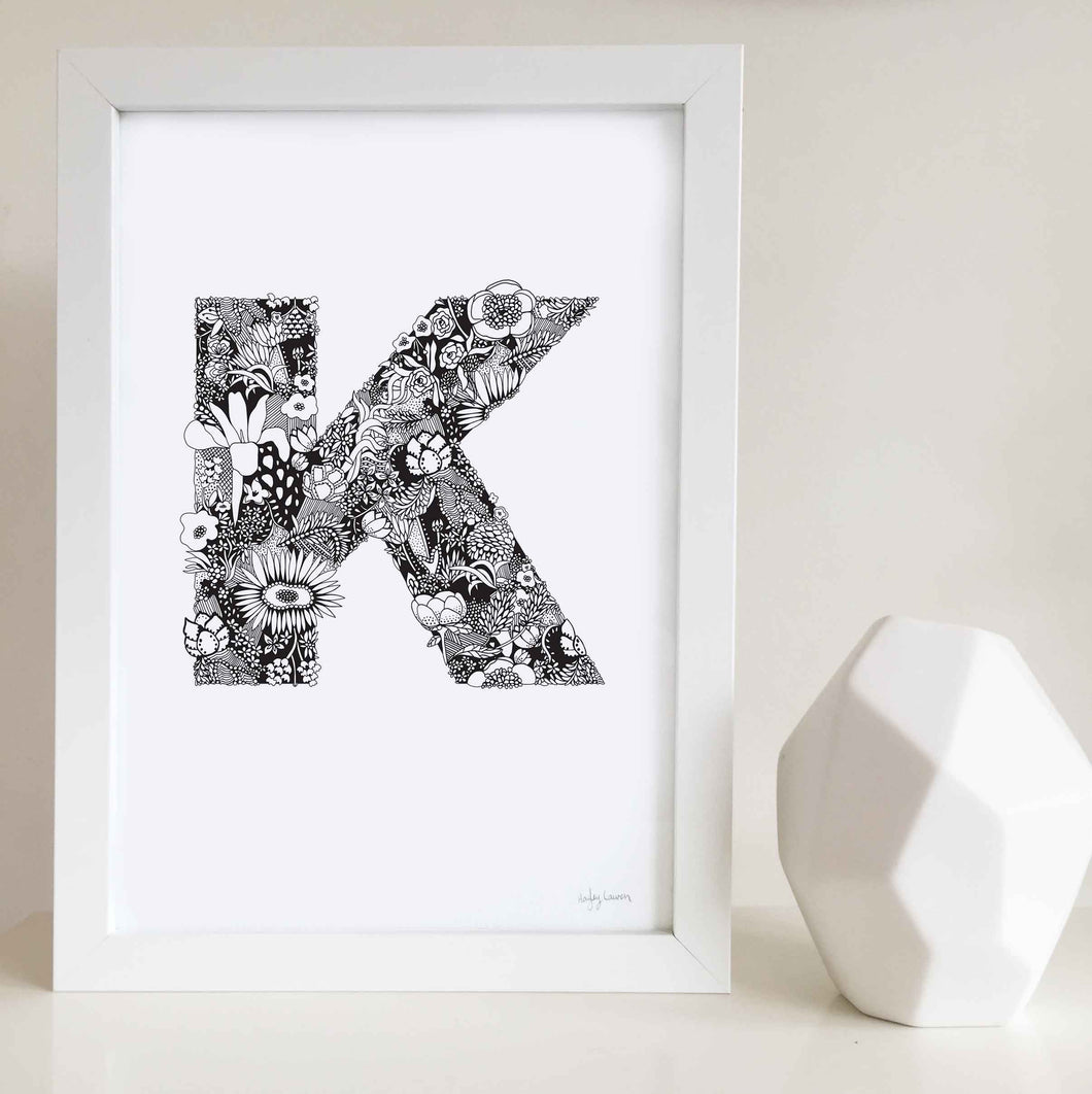 The floral letter 'K' artwork was illustrated by Hayley Lauren in Melbourne, Australia. It is the perfect artwork to personalise a nursery or kids bedroom. 